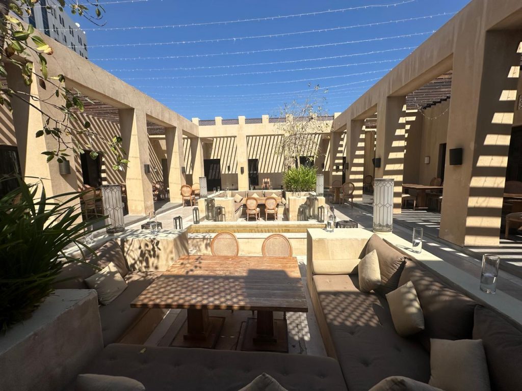 A modern courtyard inspired by Arabic design with geometric patterns.
