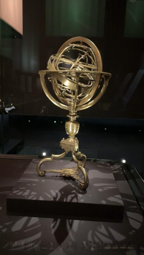 Brass armillary sphere on display, demonstrating historical Islamic astronomical knowledge.