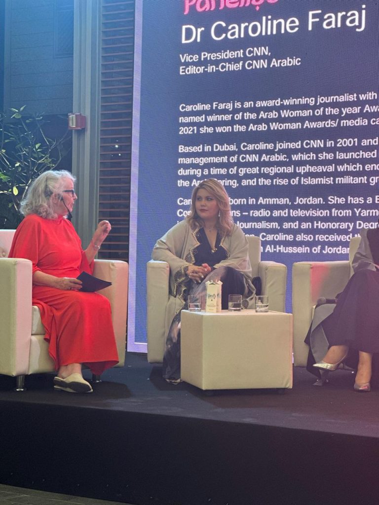 Claire Ordovsky Tanaevsky speaking on stage at Art Connects Women 2025 panel discussion and moderator Paddy