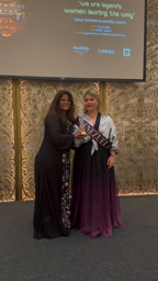 Claire Ordovsky Tanaevsky receiving award on behalf of Tatiana Latynina de Ordovsky-Tanaevsky for Venezuela