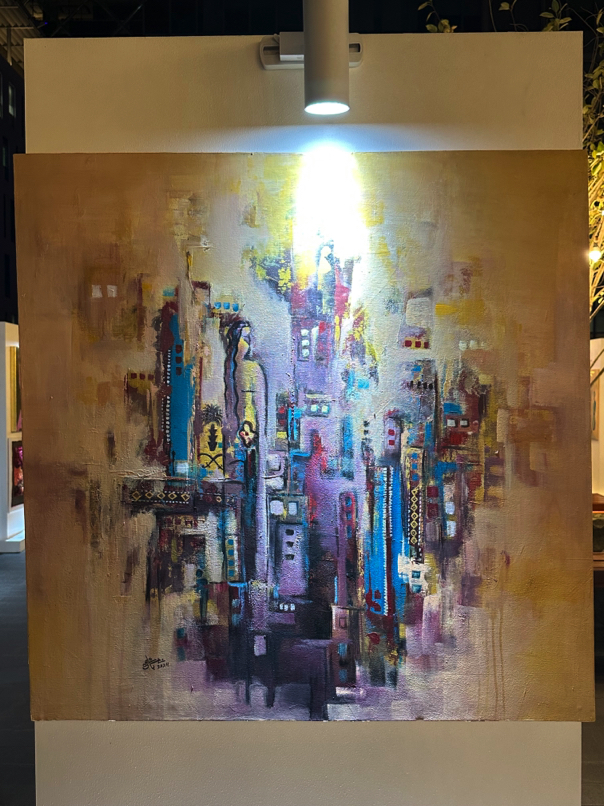 Abstract cityscape by Saudi artist — vertical brushstrokes and glowing tones evoking modernity, chaos, and harmony
