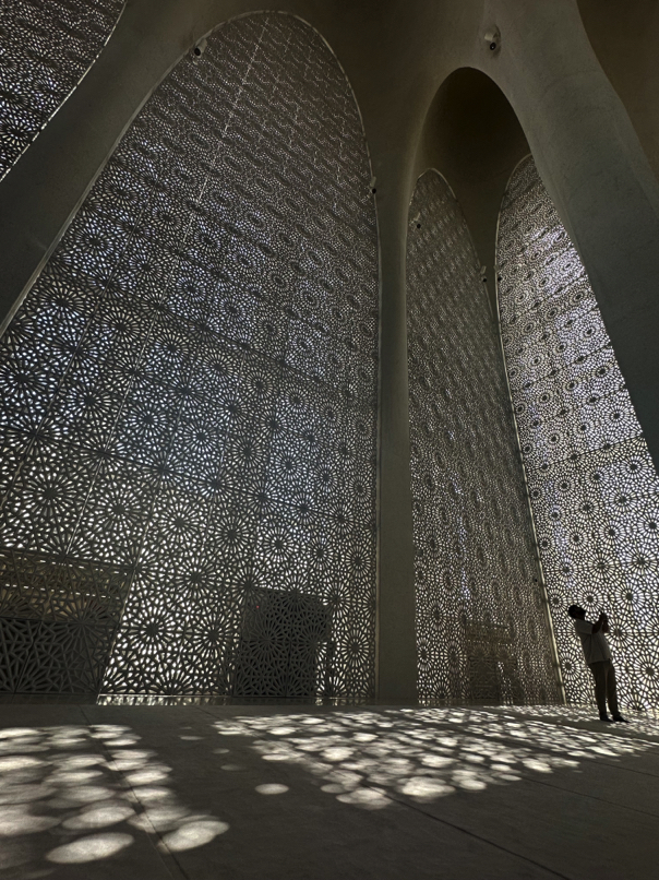 Interior of Abrahamic Family House mosque — mashrabiya design.