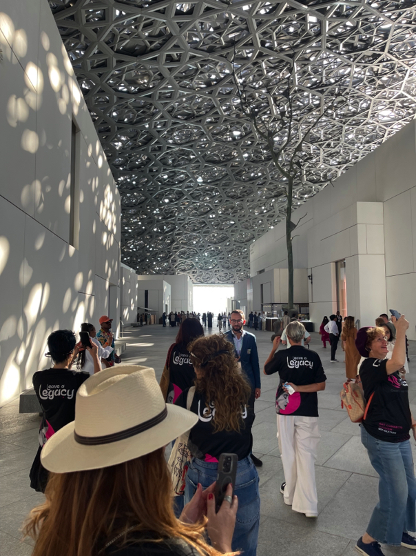 Louvre Abu Dhabi — visitors under iconic geometric dome